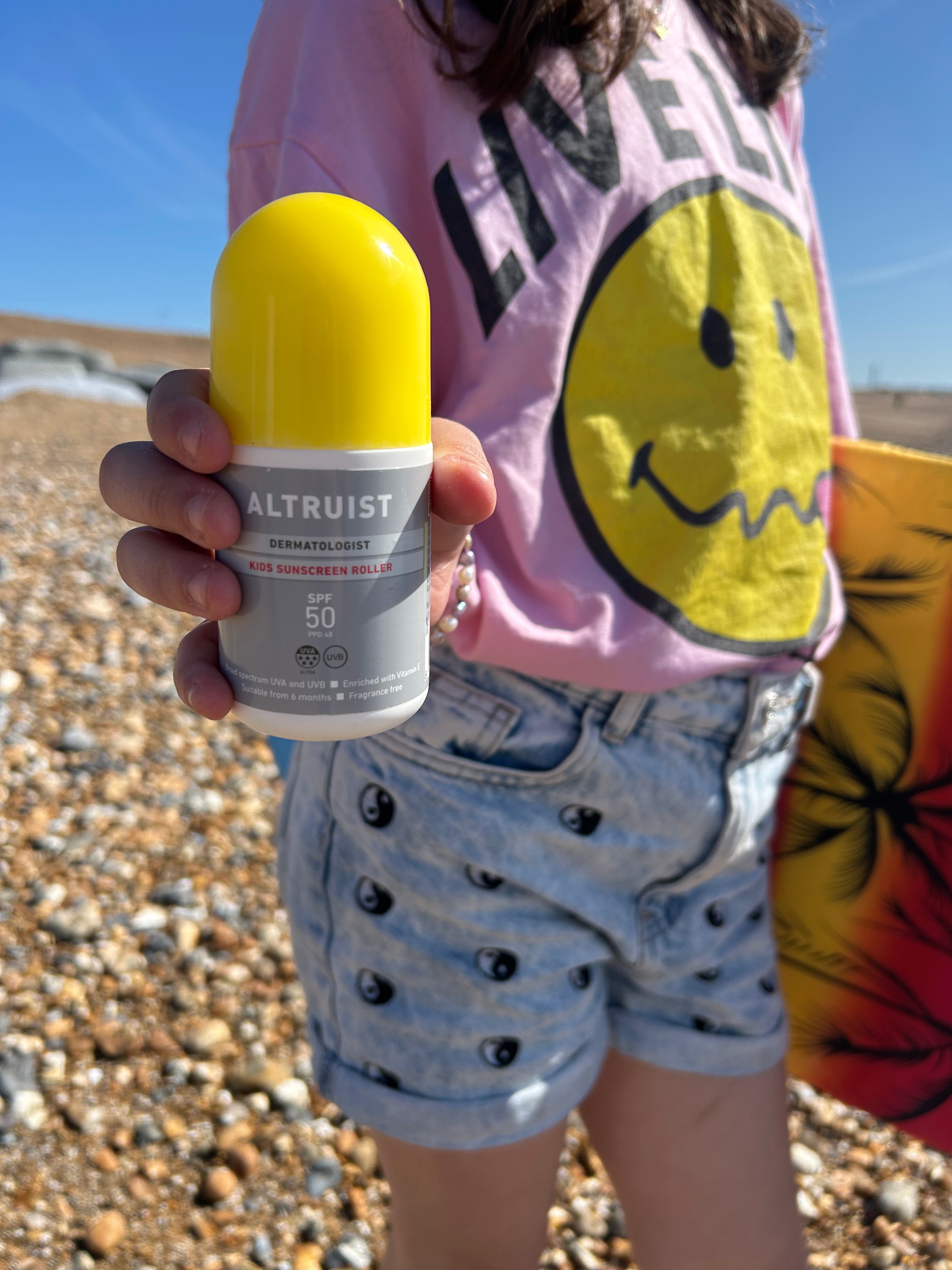 Kid_Holding_Sunscreen_Roller